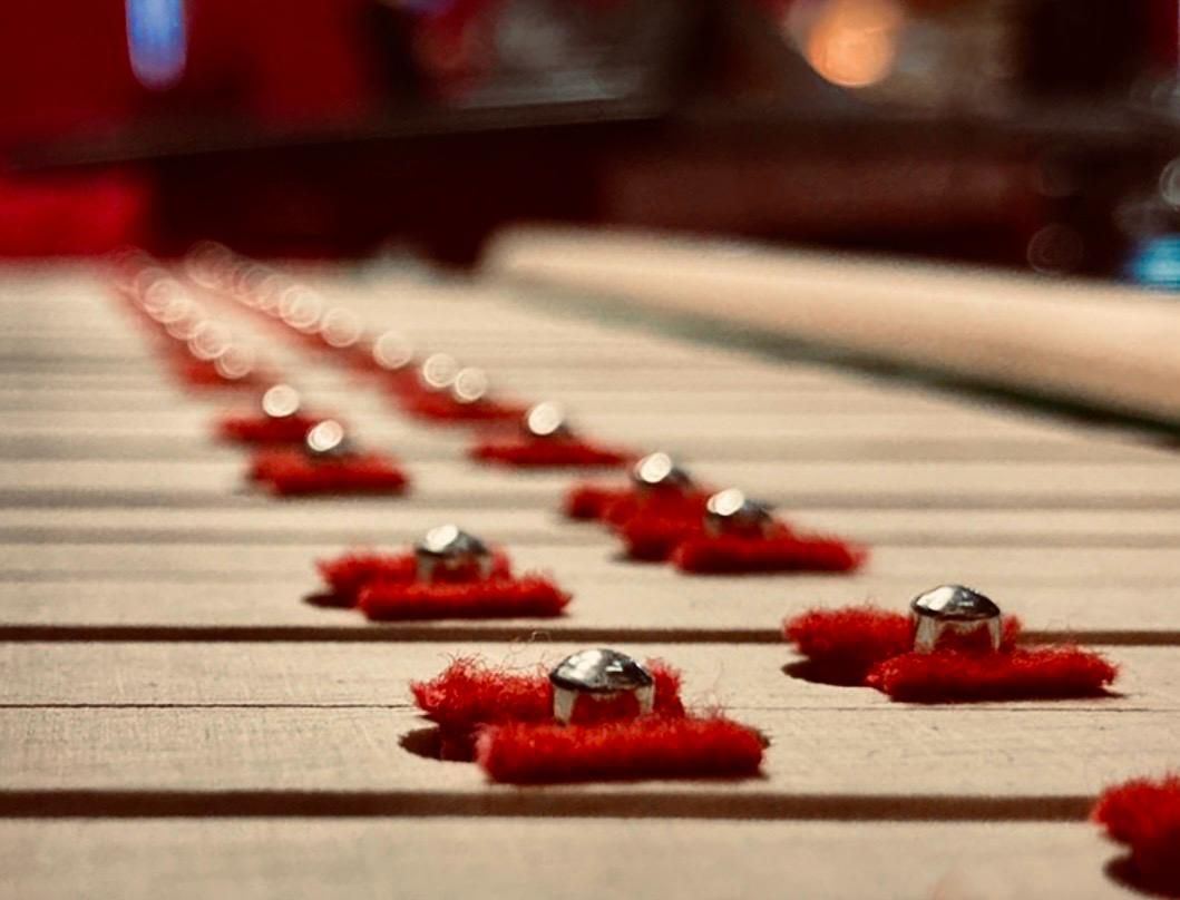 Pointes de balancier et rondelles de feutre du clavier d'un piano